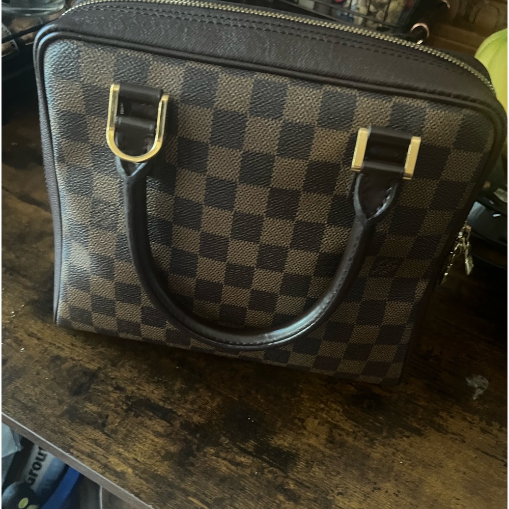 Authentic Louis Vuitton Brera in excellent condition clean in and out.